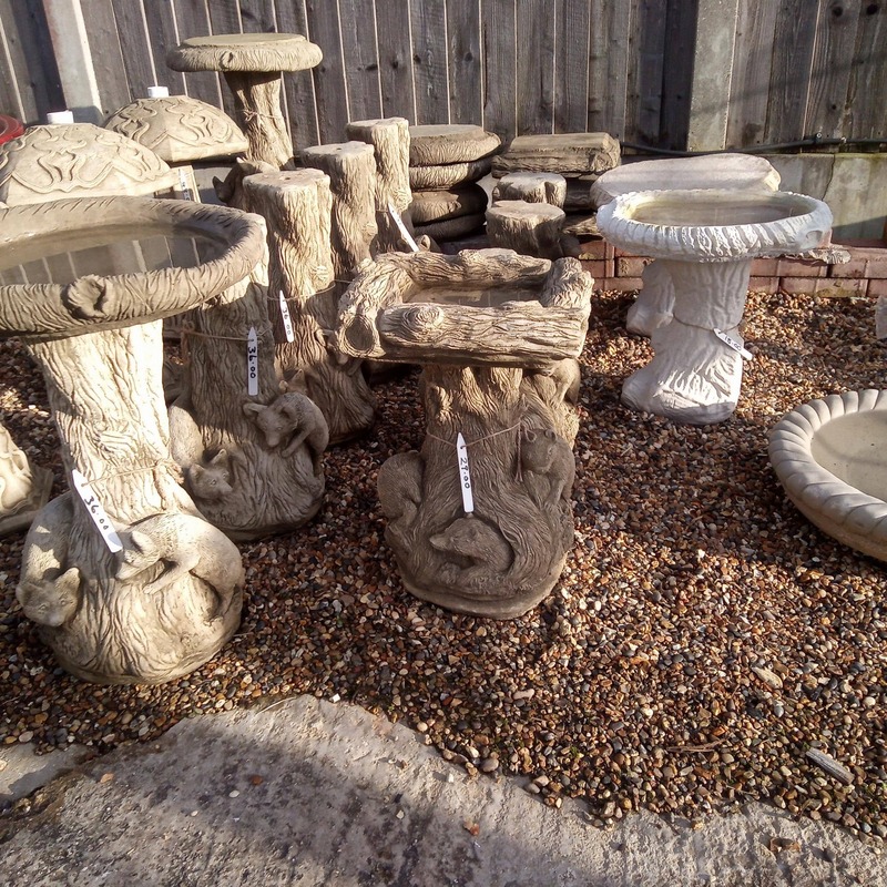 fox badger small log concrete bird baths £18 to £36